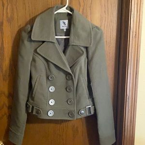 Green double breasted jacket.